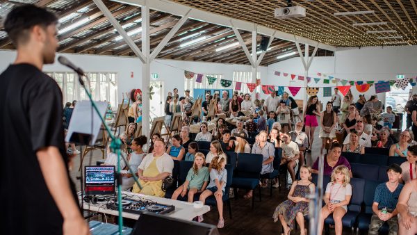 view from stage our to an audience sitting in a hall