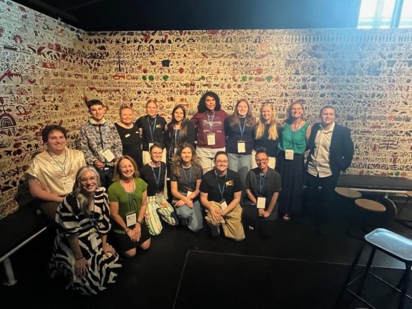 Group of people posing for a photo with their changefest langyards
